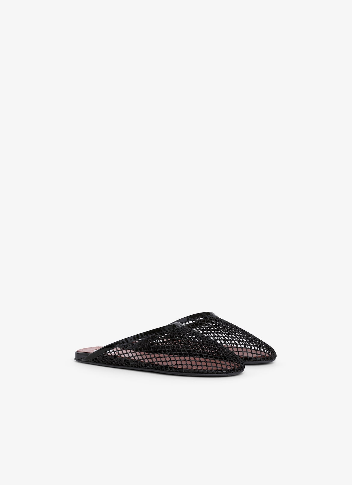 MULES PLATES EN RÉSILLE ALAÏA NOIR MULES PLATES EN RÉSILLE